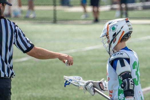 lacrosse players reviewing game footage