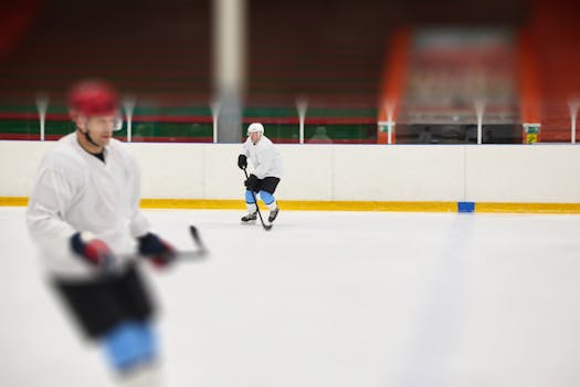 Lacrosse players in practice, ensuring safety